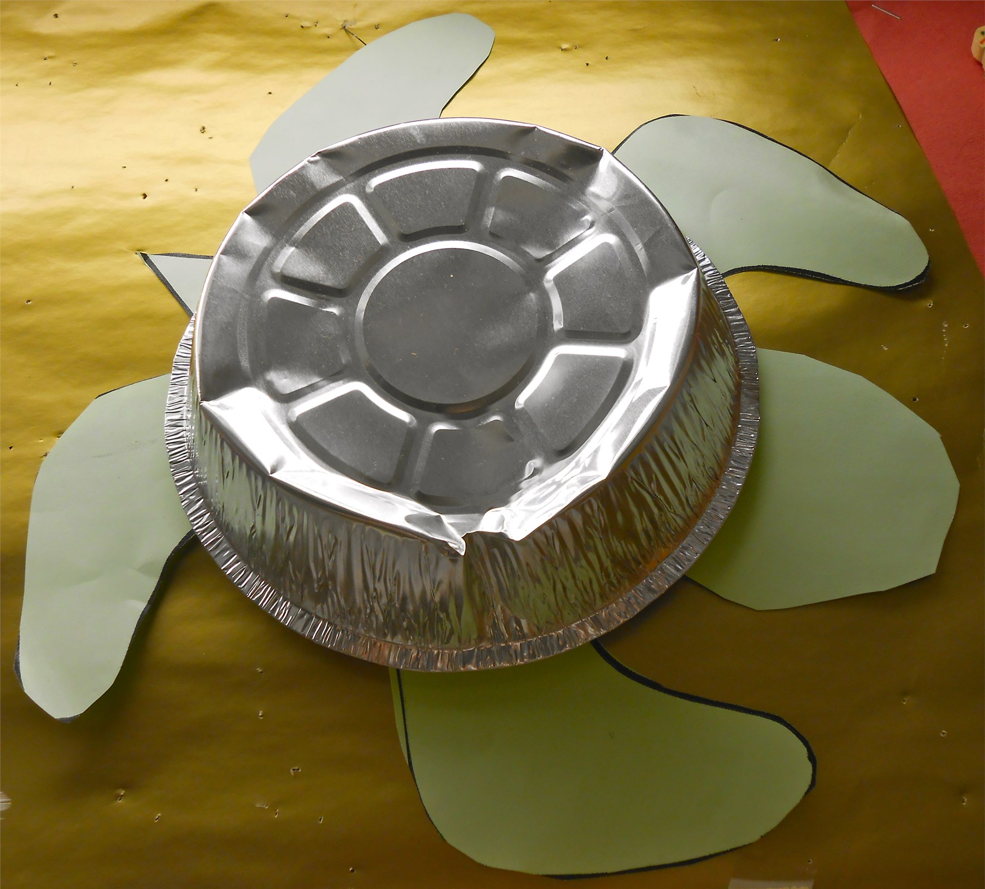 K-1 make "turtle shell" rattles