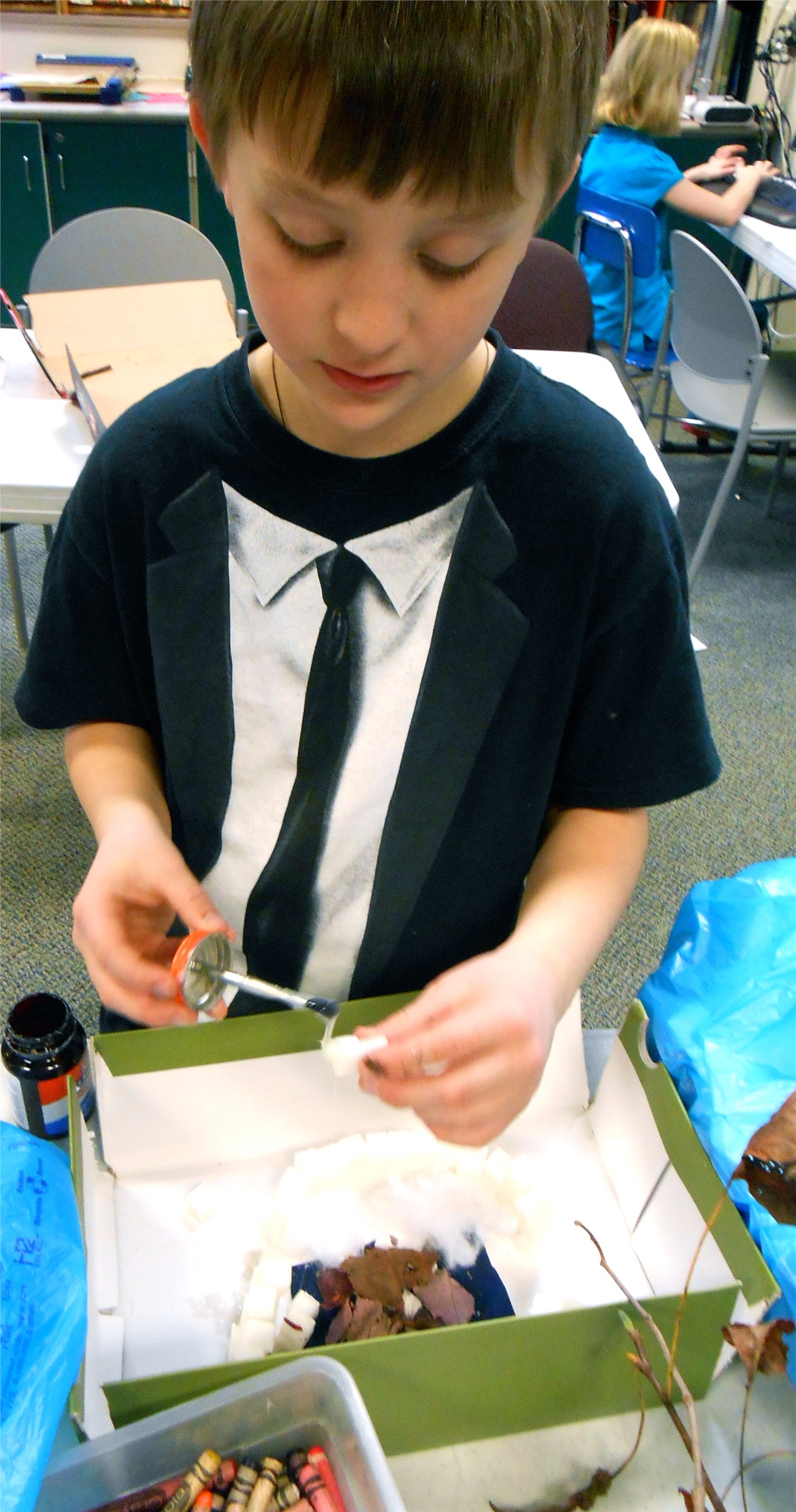 Fourth graders create models of Native American structures