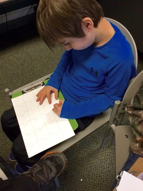 Students create designs with mathematical patterning.