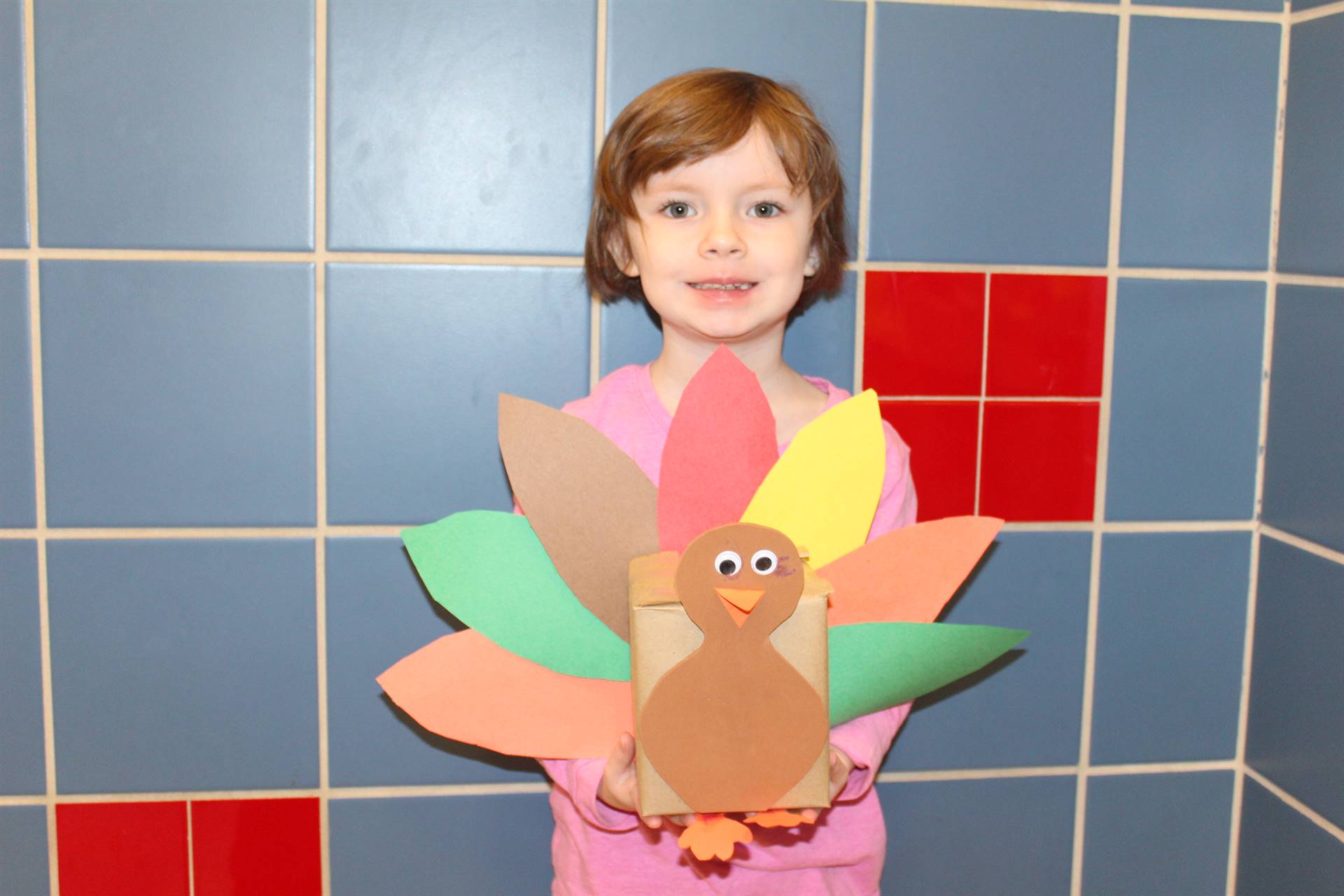 Photo of McIntyre First-Graders Creating Turkey Centerpieces, Candy Cups and Placemats