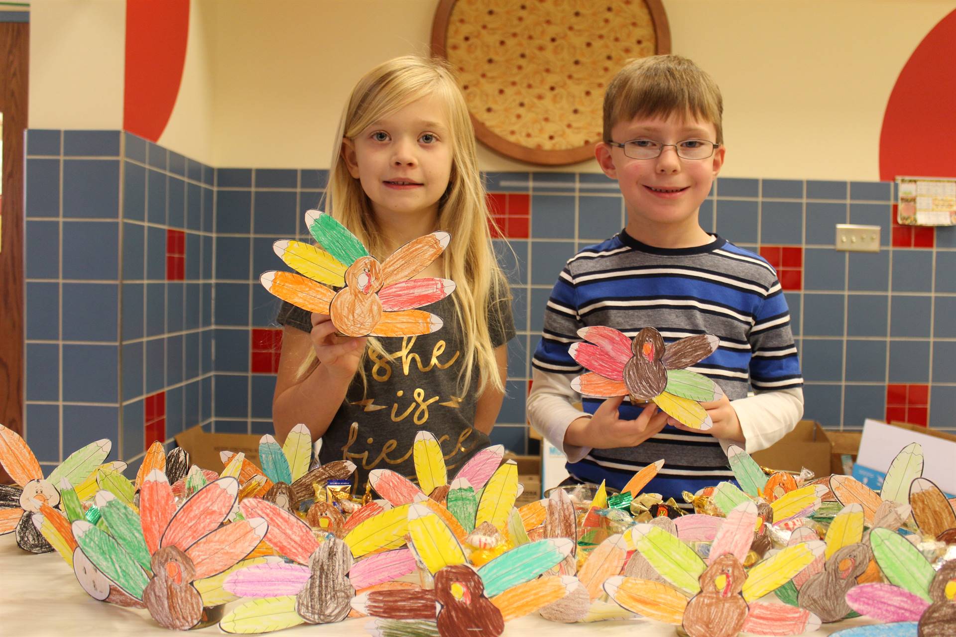 Photo of McIntyre First-Graders Creating Turkey Centerpieces, Candy Cups and Placemats