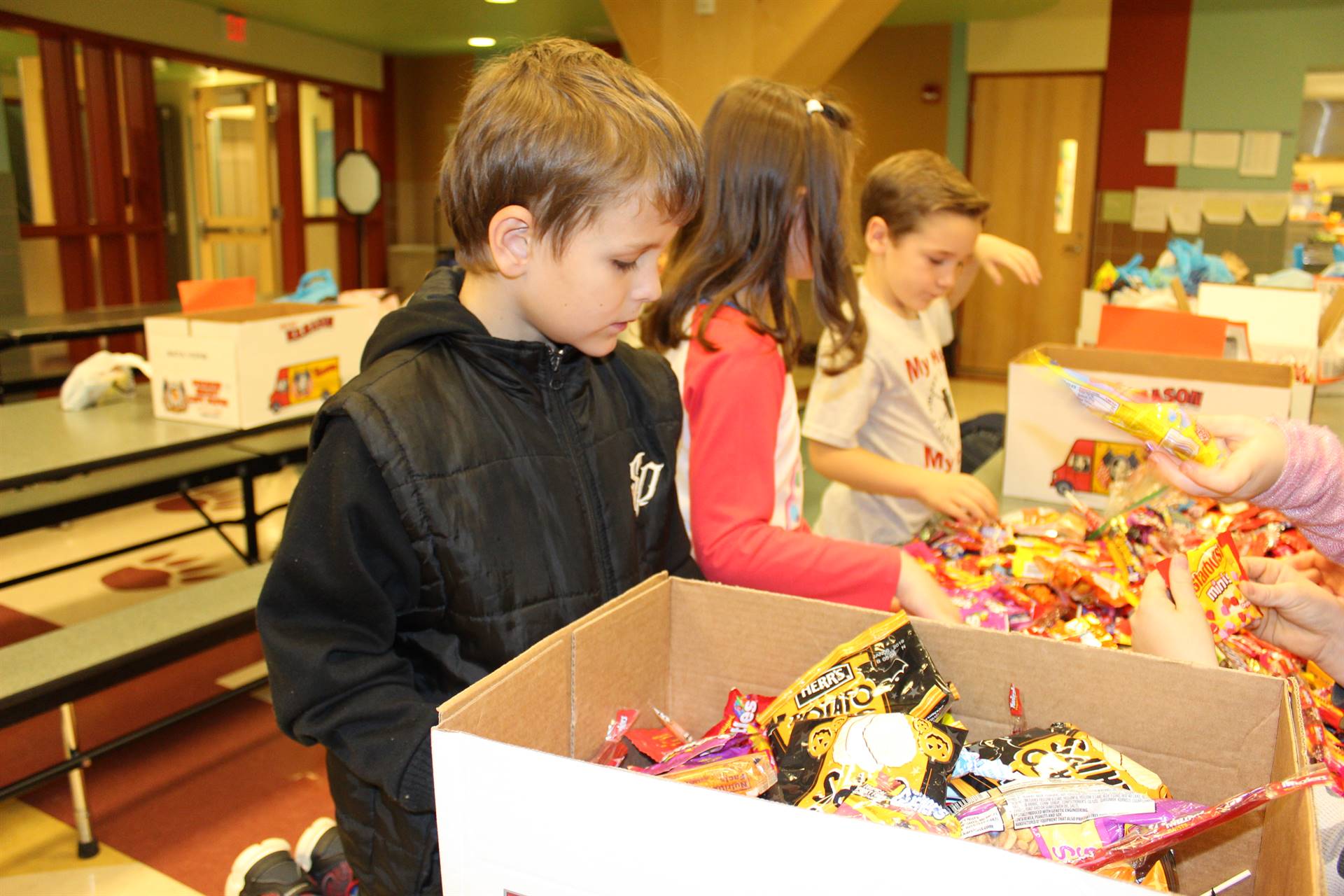 Image of Students Sorting Candy for Highcliff's Treats for Troops