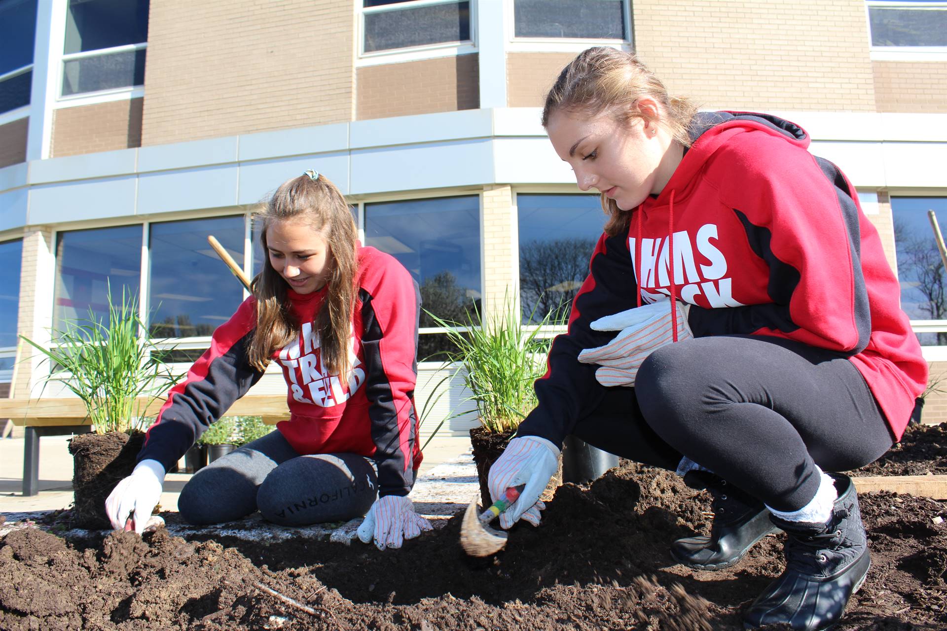 High School Students Planting Garden