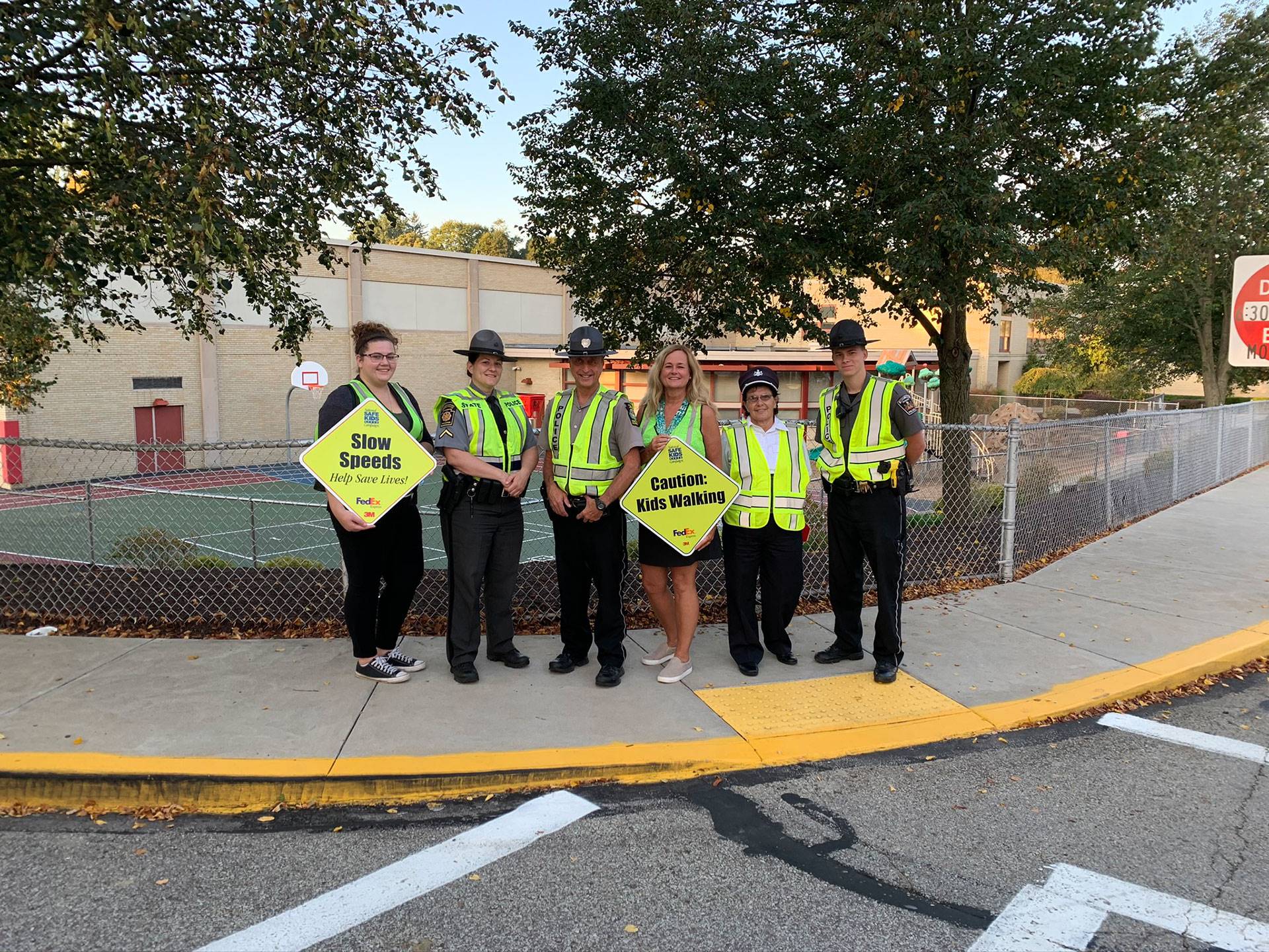 A group of crossing guards and officers at West View Elementary School on Oct. 2, 2019